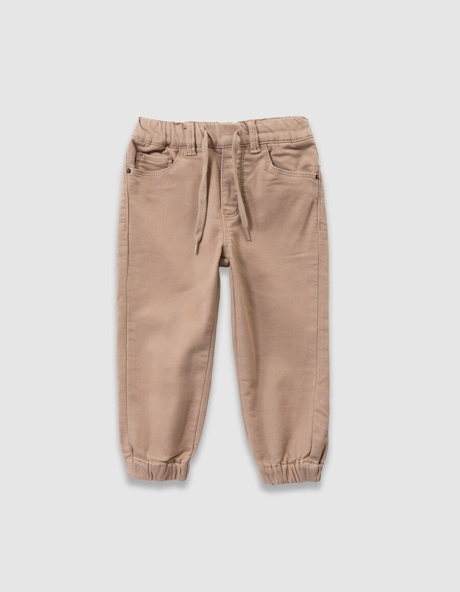 vaqueros holgados beige con cintura elástica para niño