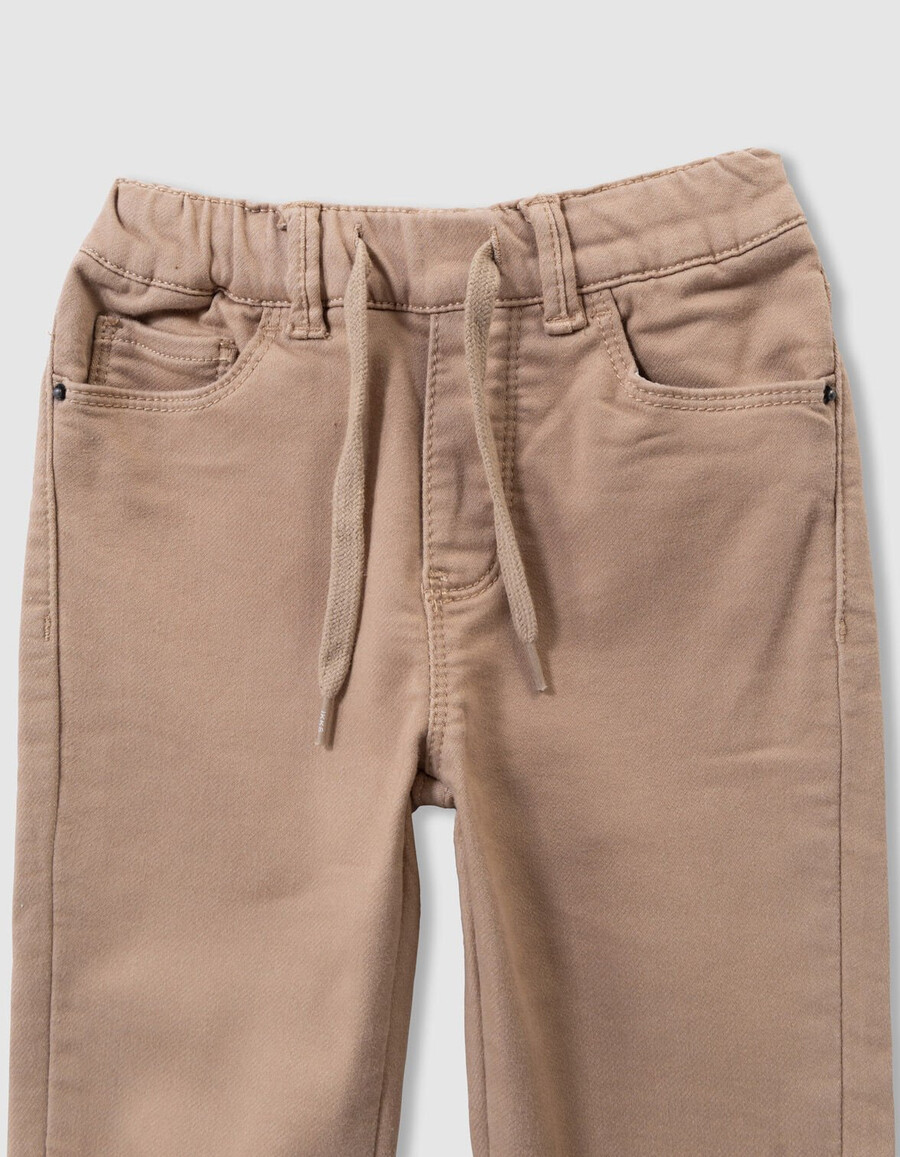 vaqueros holgados beige con cintura elástica para niño
