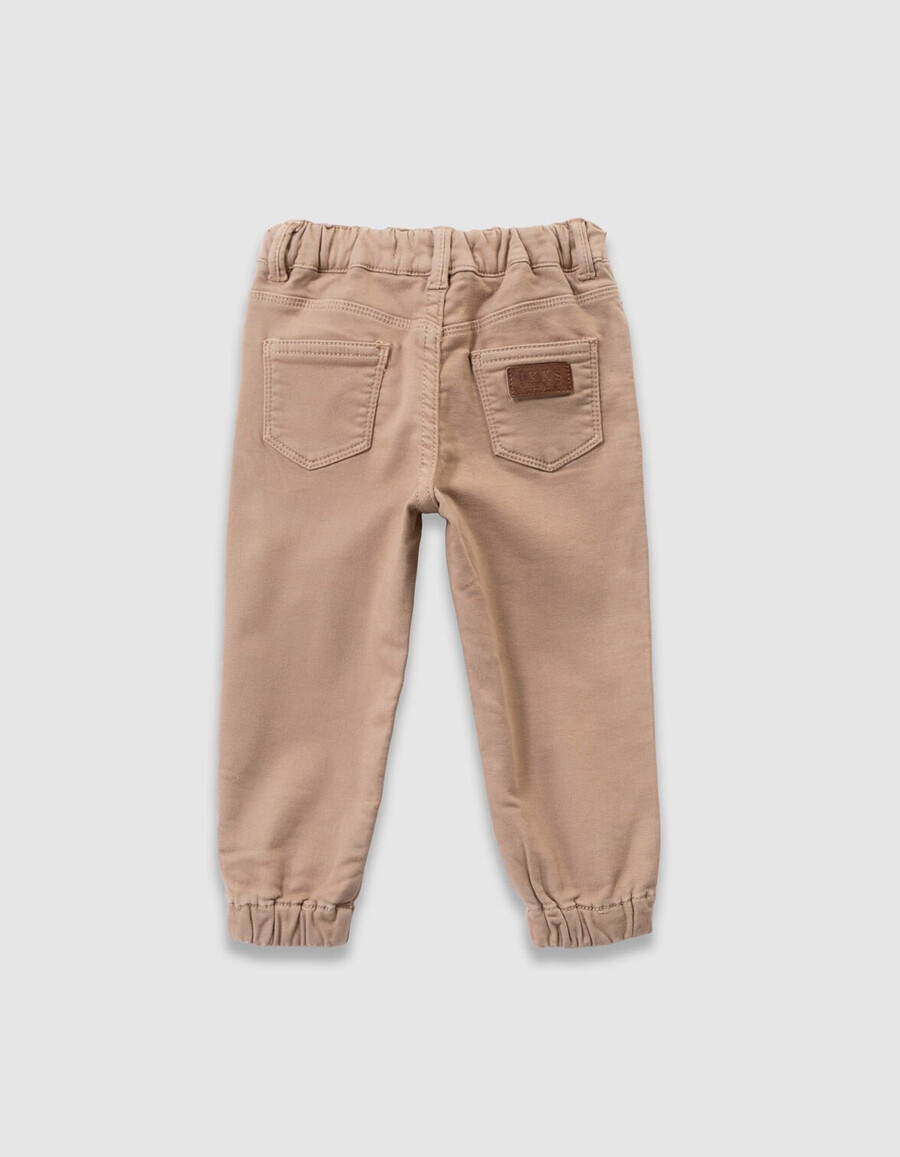vaqueros holgados beige con cintura elástica para niño