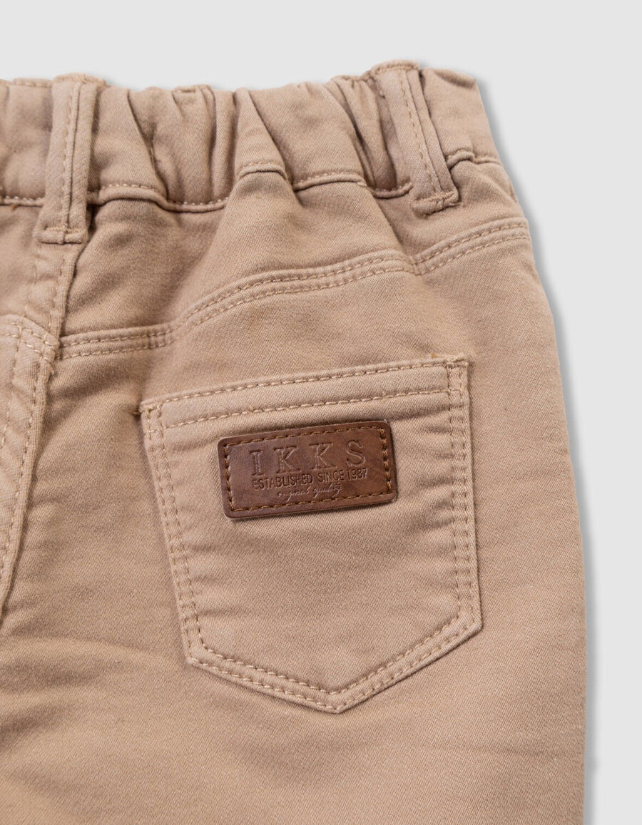 vaqueros holgados beige con cintura elástica para niño