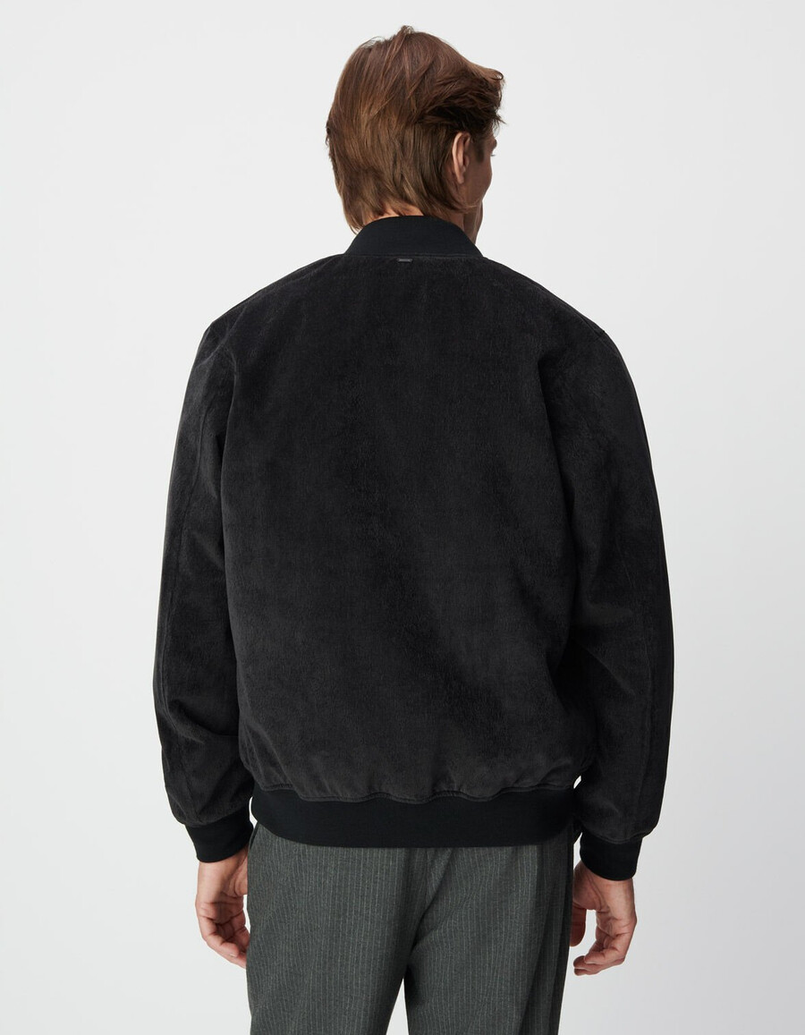 chaqueta impermeable de terciopelo acolchado negro para hombre