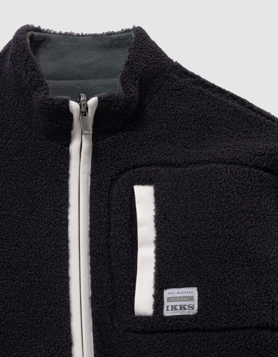 sudadera reversible tipo cárdigan de sherpa negra y verde para niño