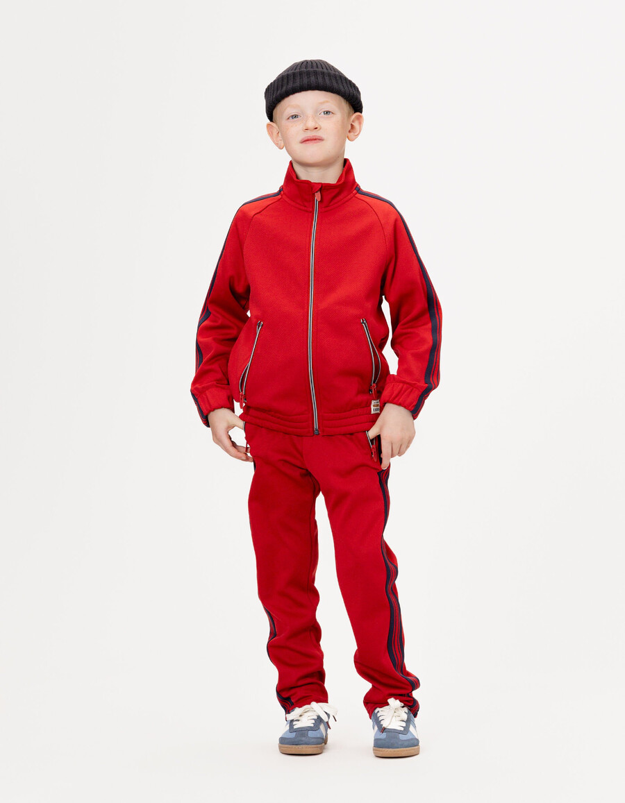 cárdigan rojo con cremallera y rayas azul marino para niño