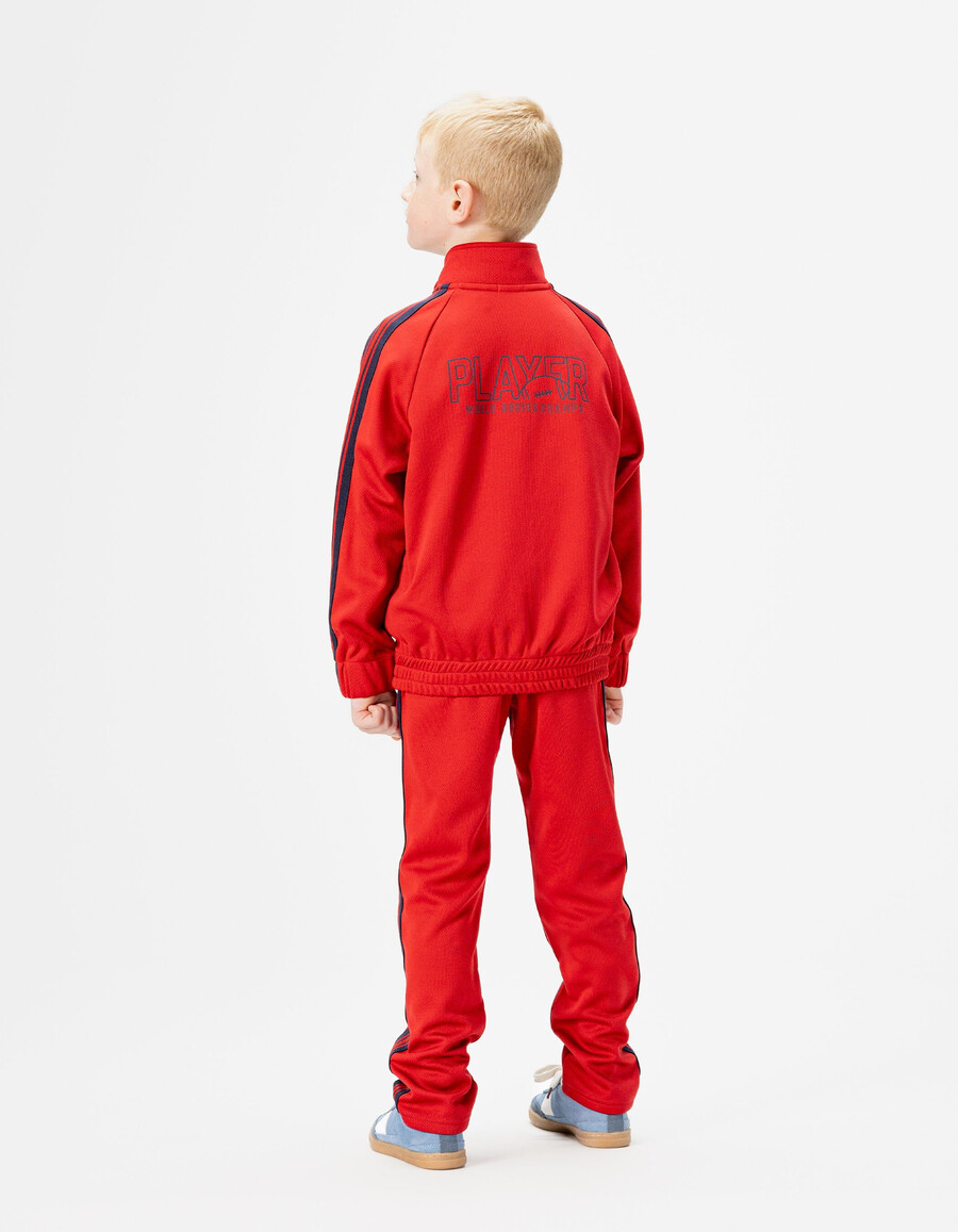 cárdigan rojo con cremallera y rayas azul marino para niño