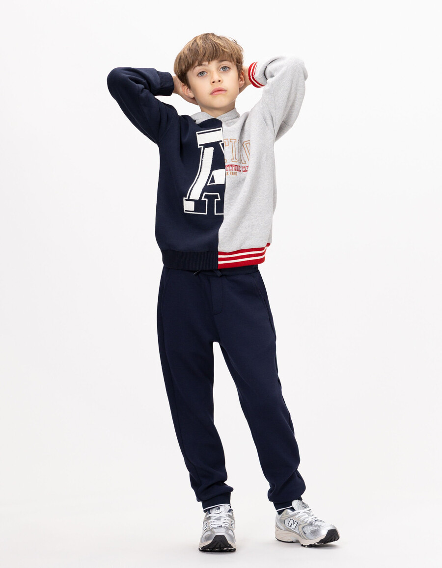 pantalones deportivos azul marino con cordón ajustable con letras para niño