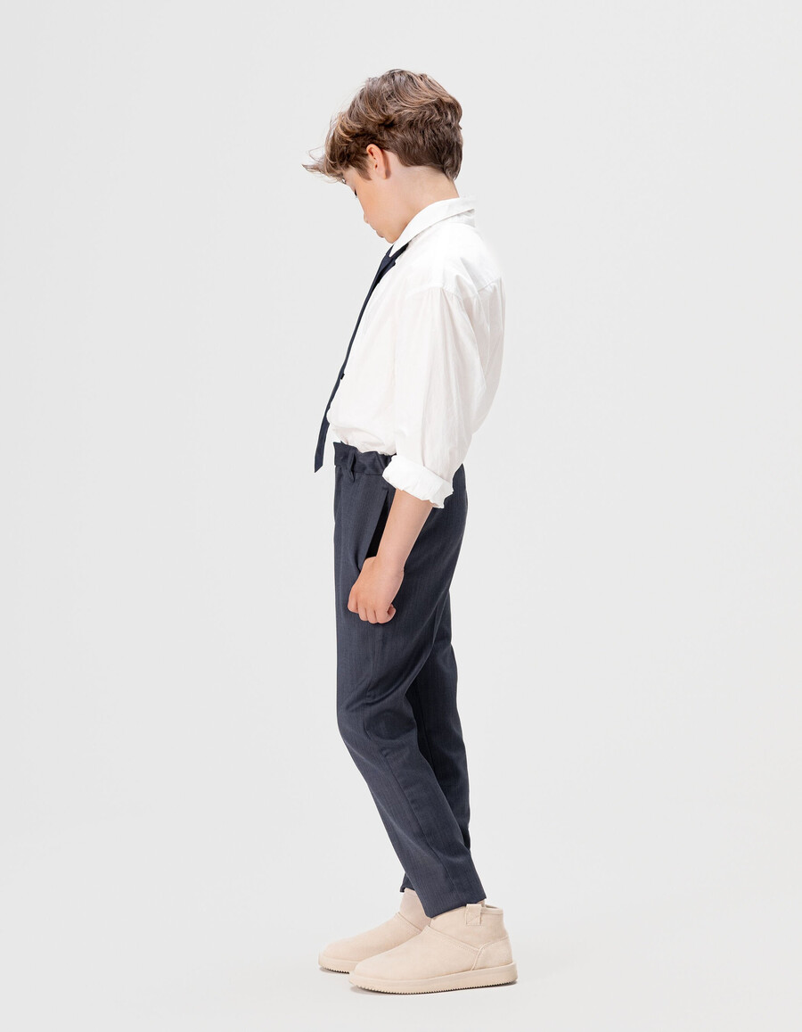 pantalones de punto azul marino para niño