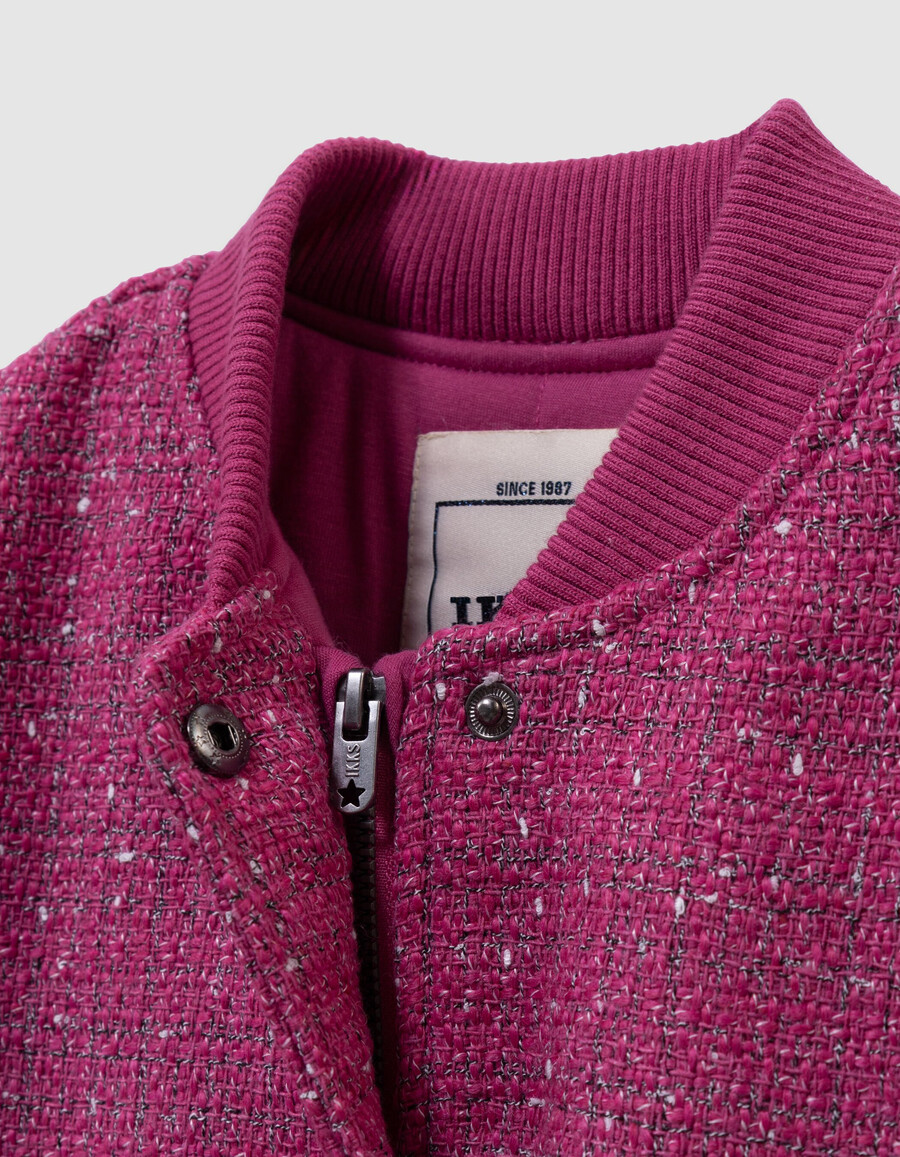 chaqueta rosa con efecto tweed para niña