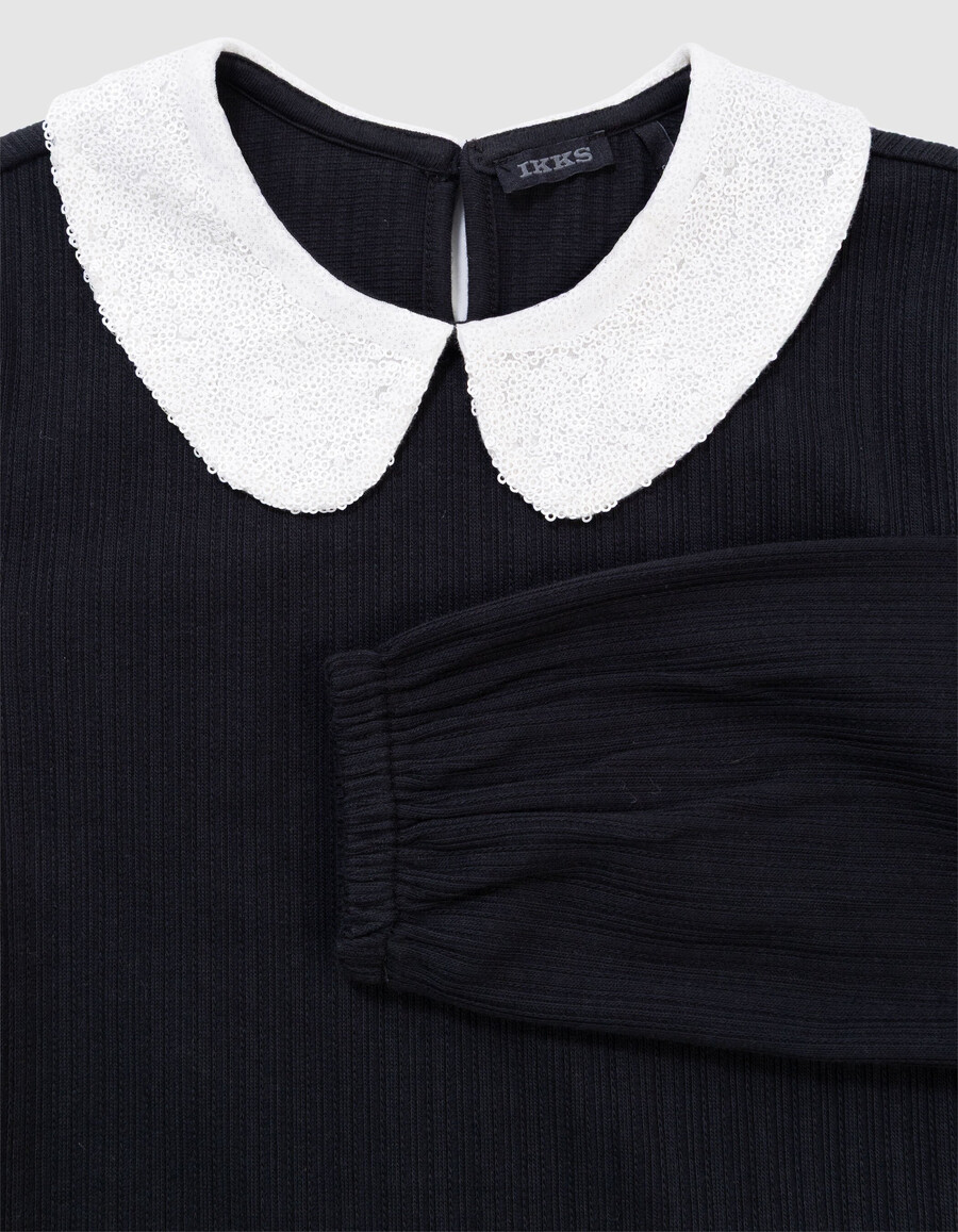 camiseta negra de manga larga para niña con cuello de lentejuelas color crudo