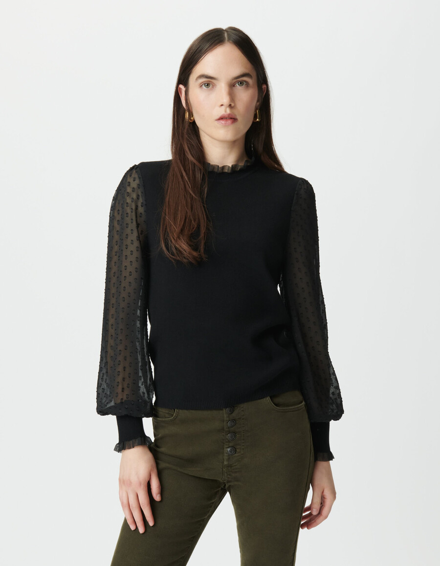 suéter de punto negro para mujer con mangas de voile suizo con lunares