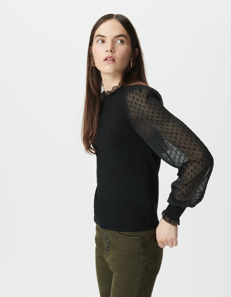 suéter de punto negro para mujer con mangas de voile suizo con lunares