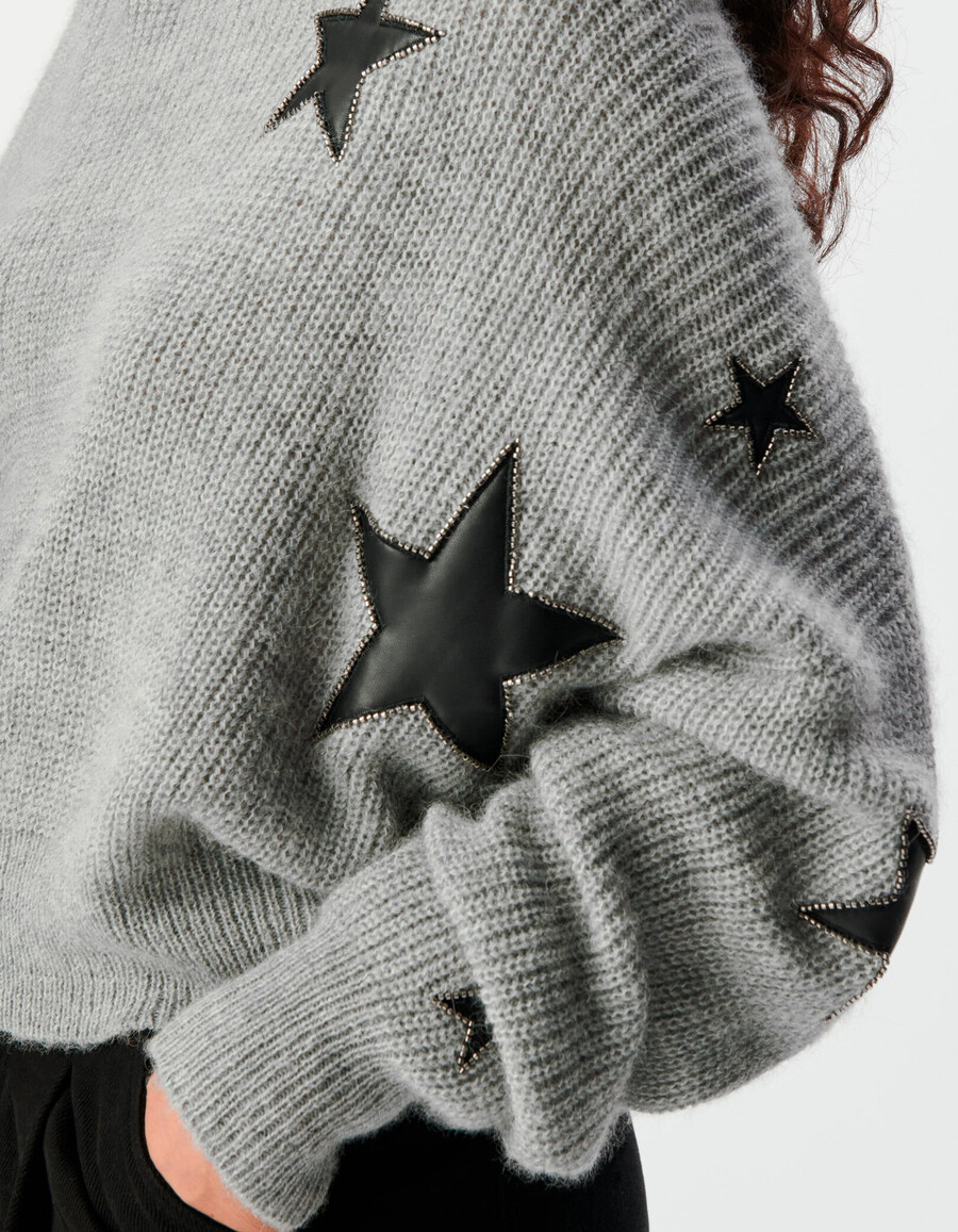 suéter de punto gris para mujer con recortes de estrellas de rock y cuentas