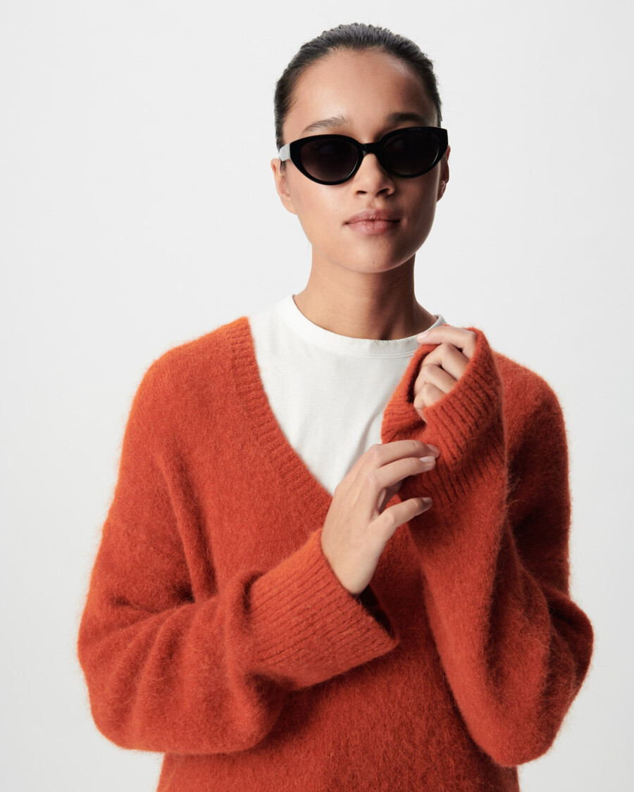 suéter naranja oversize con cuello en v para mujer