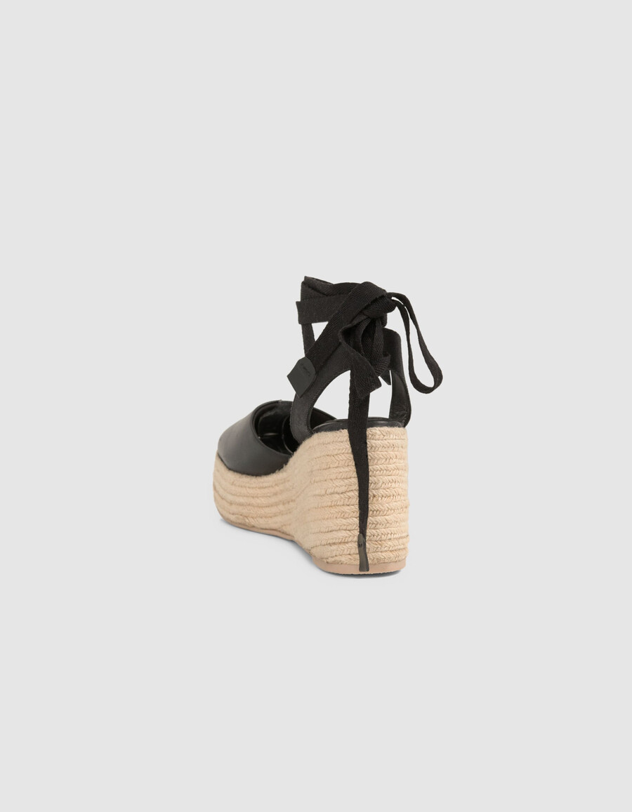 alpargatas de plataforma con cordones de cuero negro para mujer