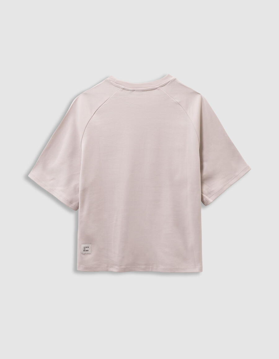 camiseta beige de algodón orgánico para niña con eslogan de terciopelo flocado