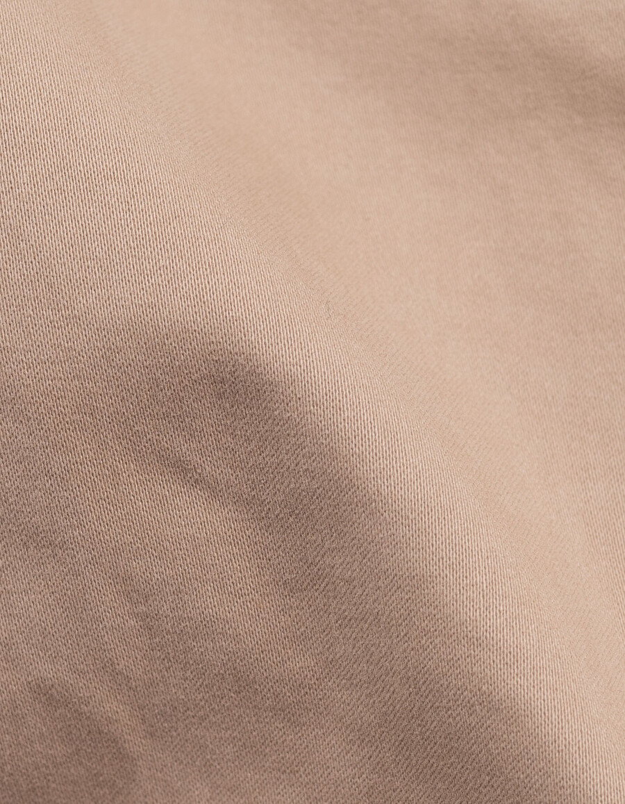 pantalones deportivos beige con cintura elástica para niño