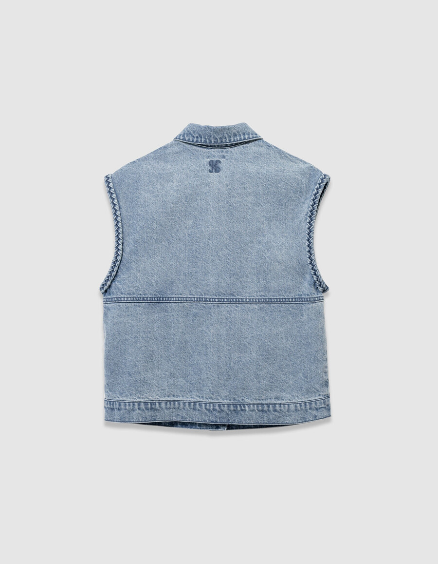 chaqueta vaquera azul sin mangas para niña