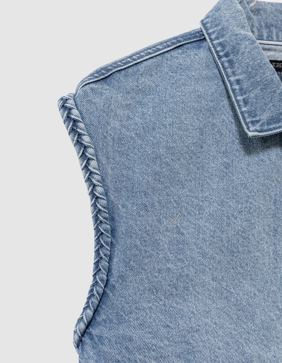chaqueta vaquera azul sin mangas para niña