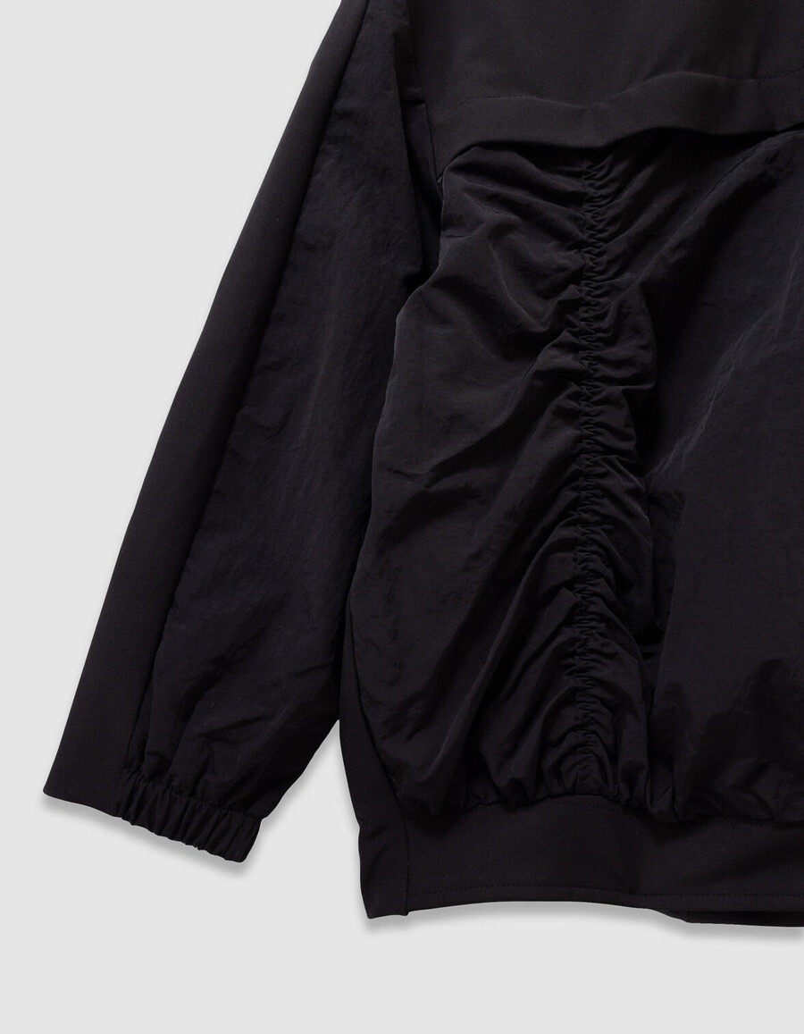 chaqueta negra de tejido mixto para niña