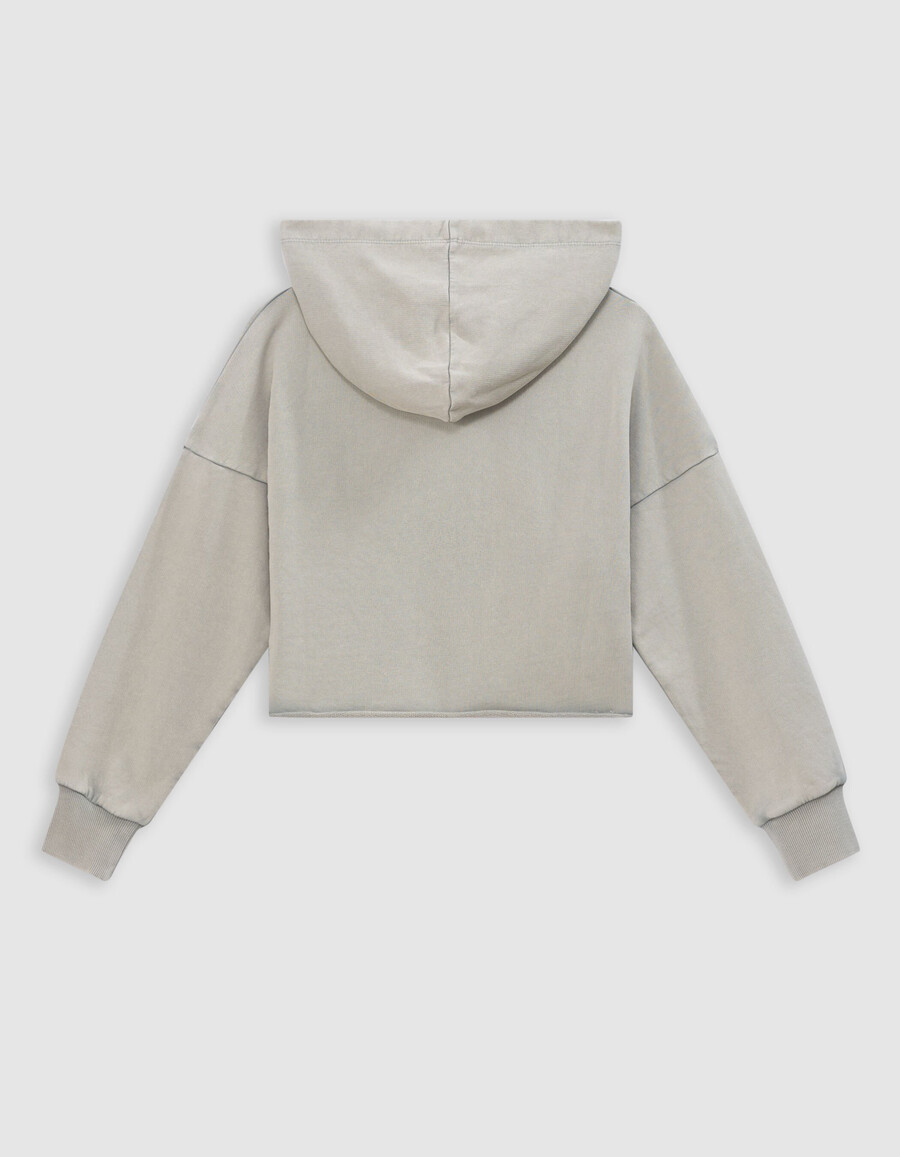 sudadera corta verde con mensaje brillante para niña
