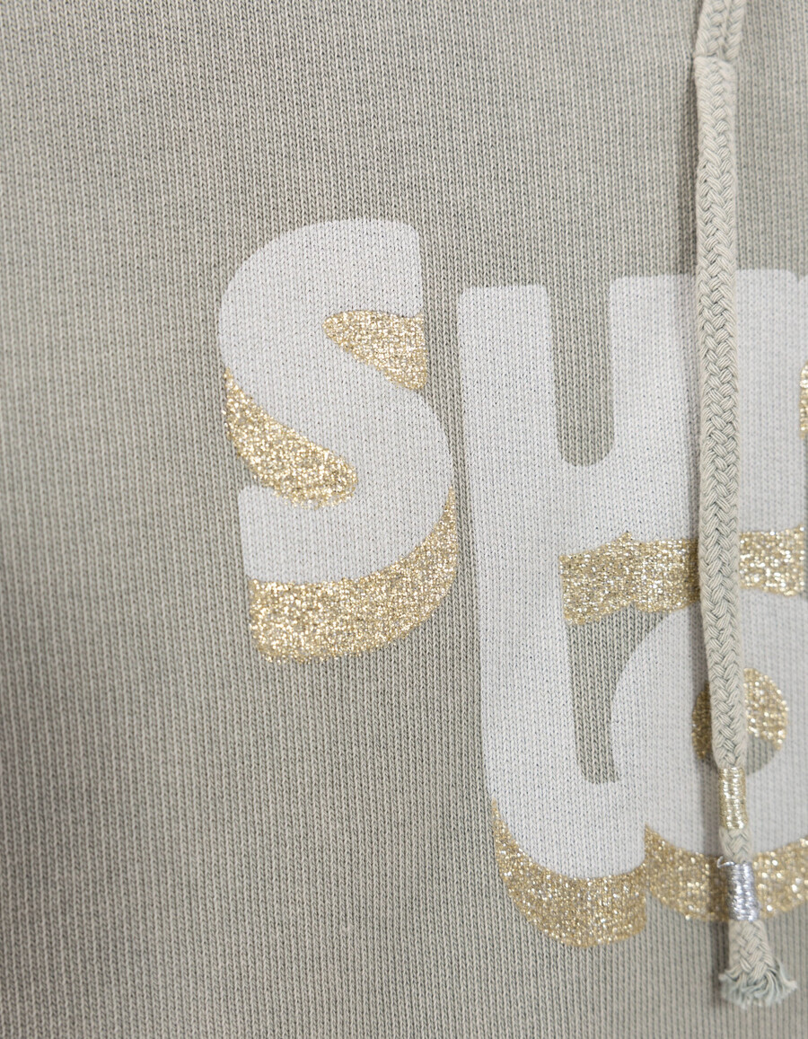 sudadera corta verde con mensaje brillante para niña