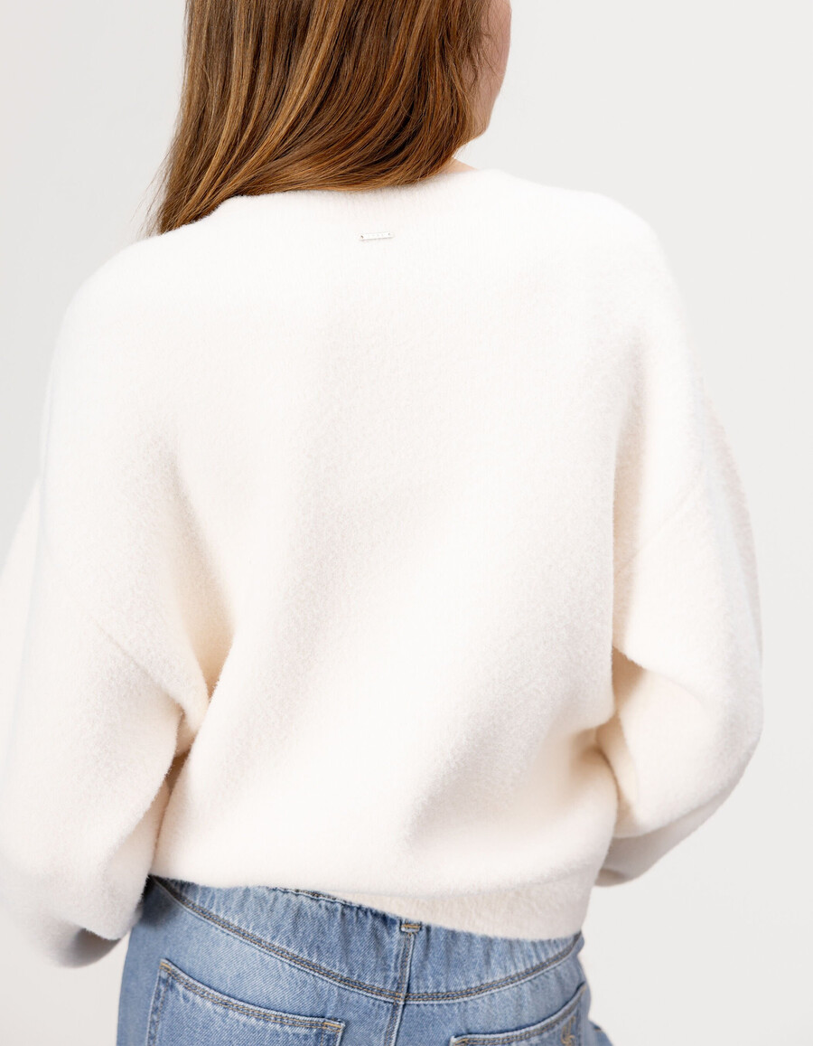cárdigan de punto suave beige con botones para niña