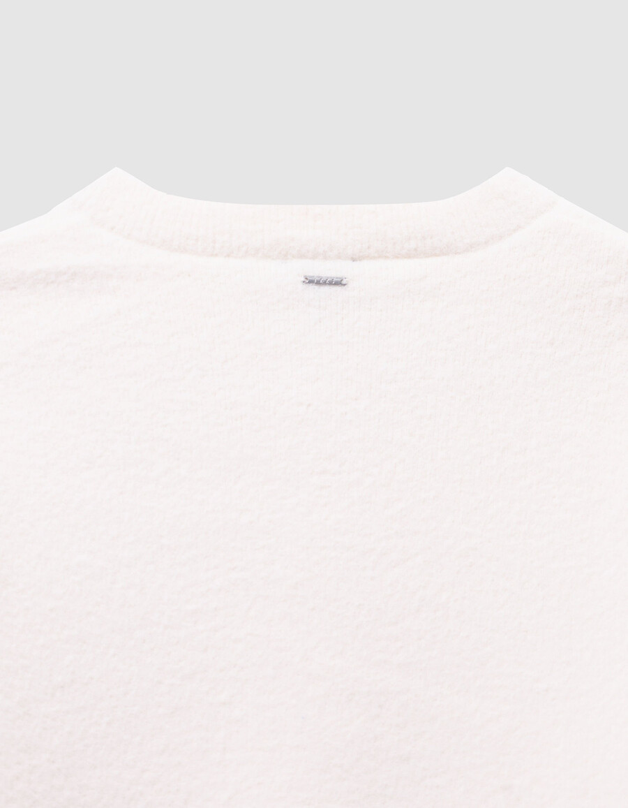 cárdigan de punto suave beige con botones para niña