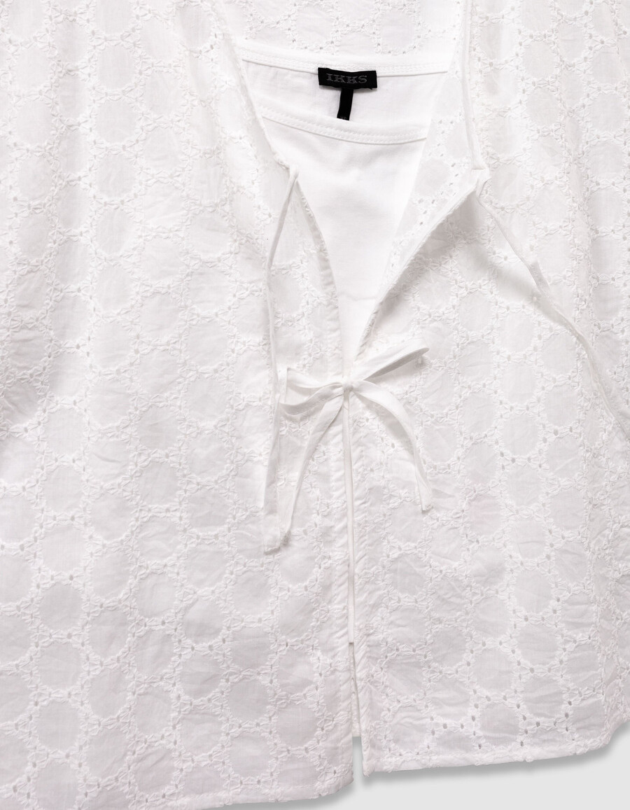 camisa blanca de encaje sin mangas para niña con lazo en la parte delantera