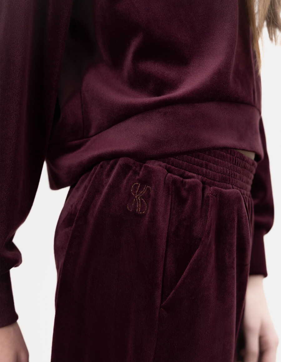 pantalones deportivos anchos de terciopelo burdeos para niña