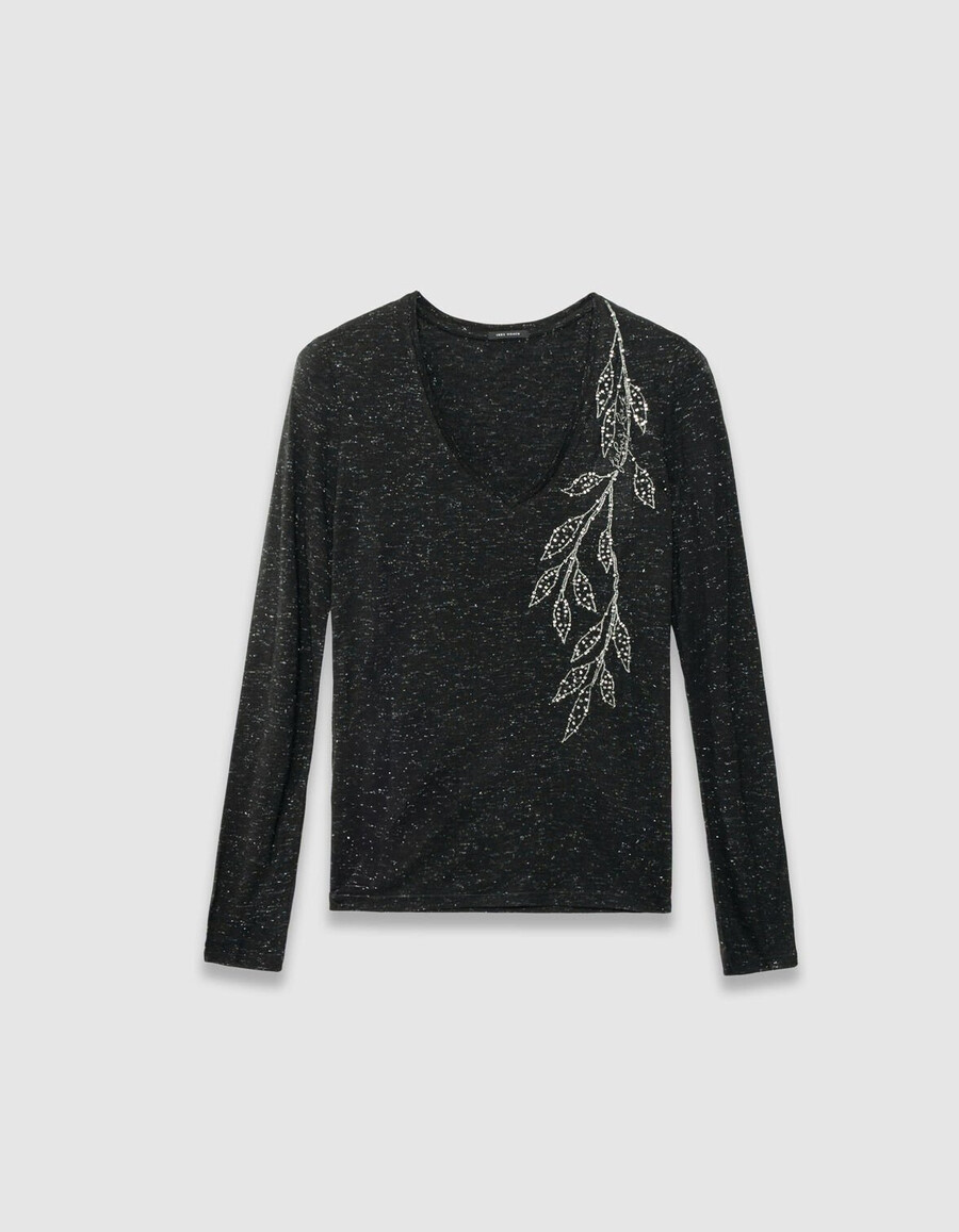 camiseta negra brillante con flores bordadas para mujer