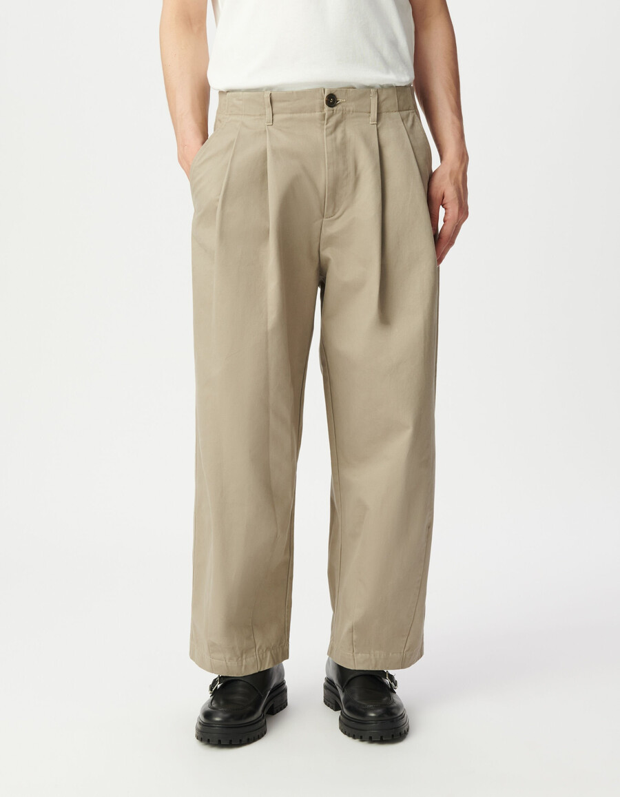 pantalones beige holgados para hombre